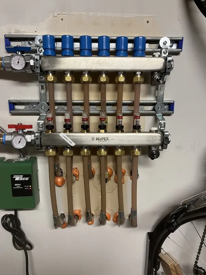 Plumber performing Water Heater Repair at a residential property in Raritan